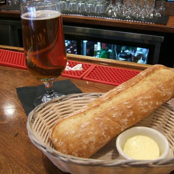 Petit Robert Bistro - Starting off with baguette and a light beer - French Near Me - Boston, Massachusetts Petit Robert Bistro - Starting off with baguette and a light beer - French Near Me - Boston, Massachusetts