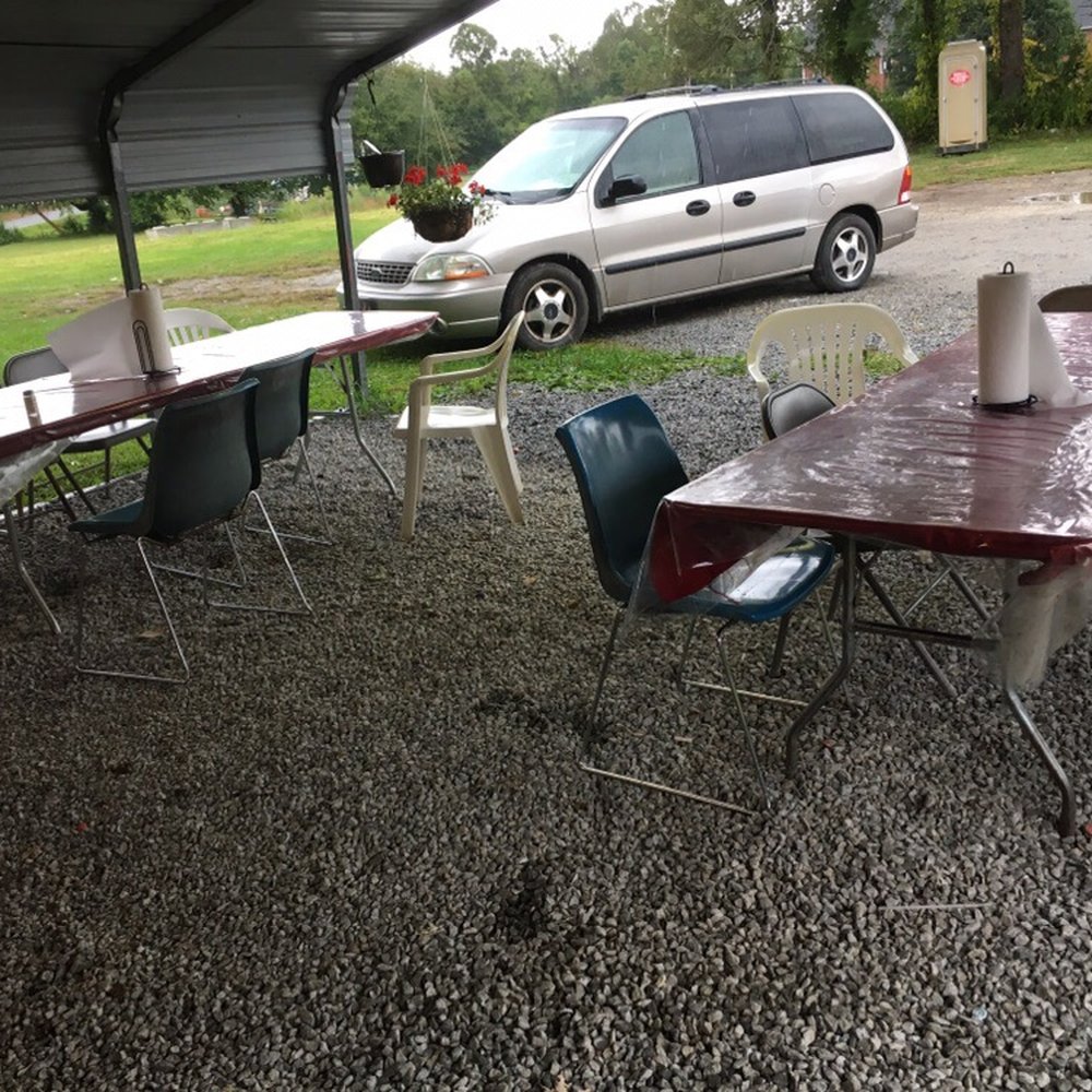 Tacos Y Burritos Express - a table and chairs under a tent - Food Trucks Near Me - East Flat Rock, North Carolina Tacos Y Burritos Express - a table and chairs under a tent - Food Trucks Near Me - East Flat Rock, North Carolina