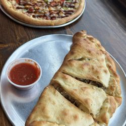 DunnEnzies Pizza - N'sync calzone  Marco Polo pizza