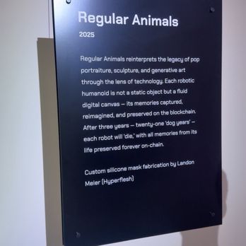 Node - Sign for robot dogs with heads of famous figures - Art Galleries Near Me - Palo Alto, California