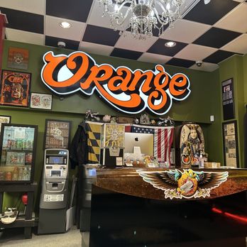 Orange Tattoo Company - The front desk inside the shop - Tattoo Near Me - Annapolis, Maryland Orange Tattoo Company - The front desk inside the shop - Tattoo Near Me - Annapolis, Maryland