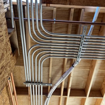 Salt N Light Electric - New construction commerical job. Electrical EMT conduit running to electrical panels - Electricians Near Me - Irvine, California