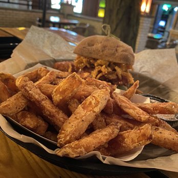 Barney's - a basket of fries and a sandwich - Bars Near Me - London, Ontario