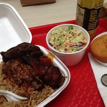 The Islands Caribbean Restaurant - Jerk chicken, rice and peas, gravy, large coleslaw and a festival - Caribbean Near Me - Toronto, Ontario