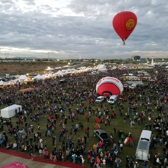 Rainbow Ryders - Our view from our hot air balloon of the masses of people down below during the Balloon Fiesta last month! - Hot Air Balloons Near Me - Albuquerque, New Mexico Rainbow Ryders - Our view from our hot air balloon of the masses of people down below during the Balloon Fiesta last month! - Hot Air Balloons Near Me - Albuquerque, New Mexico