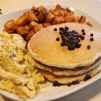 Omonia Cafe - Home fries, scrambled eggs and chocolate chip pancakes - Bakeries Near Me - Astoria, New York Omonia Cafe - Home fries, scrambled eggs and chocolate chip pancakes - Bakeries Near Me - Astoria, New York