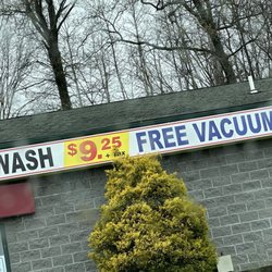 Panache Car Wash - 20 foot long sign says FREE VACUUM.
