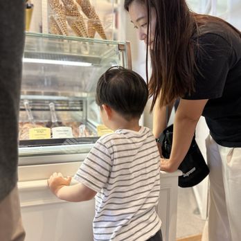 Bacio di Latte - Kid looking serious in what to choose - Ice Cream & Frozen Yogurt Near Me - Los Angeles, California Bacio di Latte - Kid looking serious in what to choose - Ice Cream & Frozen Yogurt Near Me - Los Angeles, California