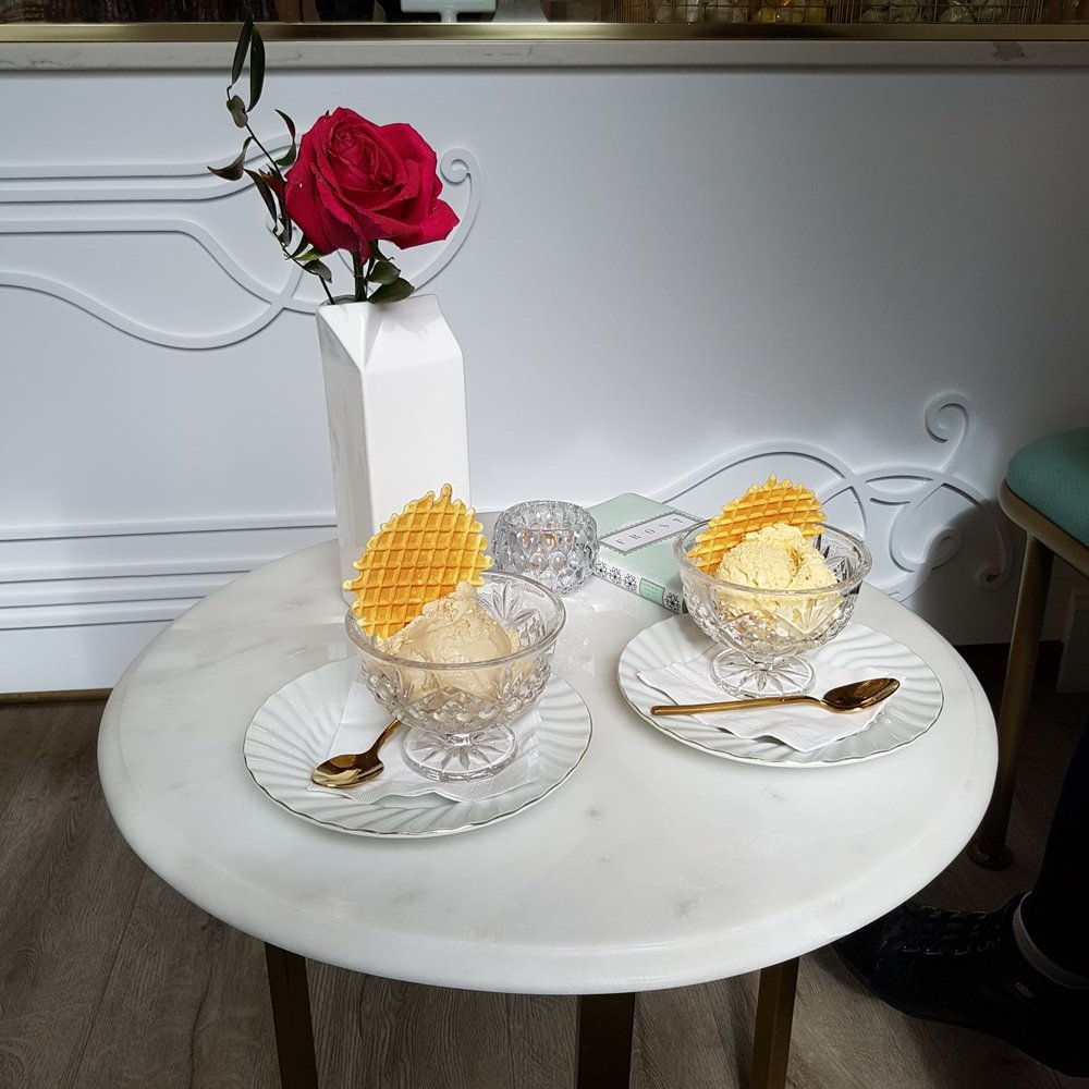 Coffee and lavender with waffle cookie in a cup; Bay leaf and almond with waffle cookie in a cup