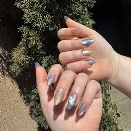 Gel X with cat eye polish and astral sequins Gel X with cat eye polish and astral sequins