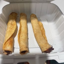 The taquito combo missing the rice and beans. We specifically ordered the $15.99 combo instead of the $6.99 taquito a la carte.