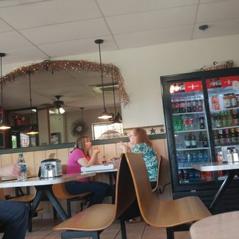 Gara's Pizza - a man and a woman sitting at a table - Pizza Near Me - Lopatcong, New Jersey Gara's Pizza - a man and a woman sitting at a table - Pizza Near Me - Lopatcong, New Jersey