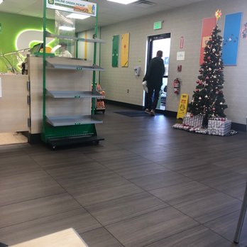 Subway - a man walking through a subway with a christmas tree in the background - Sandwiches Near Me - Coventry, Rhode Island Subway - a man walking through a subway with a christmas tree in the background - Sandwiches Near Me - Coventry, Rhode Island