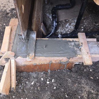 C-H Construction - New foundation footing, anchored to the ground - General Contractors Near Me