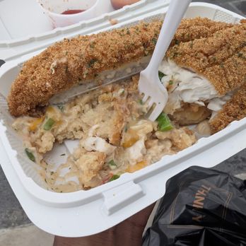 Biscuit Tyme - Crab & Biscuit with Catfish partially eaten so you can see the deliciousness - Food Trucks Near Me Biscuit Tyme - Crab & Biscuit with Catfish partially eaten so you can see the deliciousness - Food Trucks Near Me