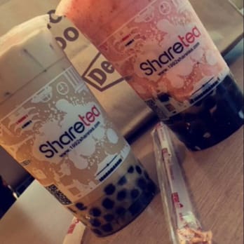 Sharetea - Left: Okinawa Pearl Milk Tea w/ 30% ice Right: Strawberry Ice Blend w/ Pearls - Coffee & Tea Near Me - San Francisco, California Sharetea - Left: Okinawa Pearl Milk Tea w/ 30% ice Right: Strawberry Ice Blend w/ Pearls - Coffee & Tea Near Me - San Francisco, California