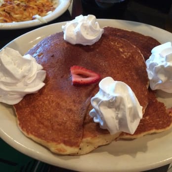 Cafe Java - Austin - Sweet cream pancakes with whipped cream and strawberries on top! - Coffee & Tea Near Me - Austin, Texas Cafe Java - Austin - Sweet cream pancakes with whipped cream and strawberries on top! - Coffee & Tea Near Me - Austin, Texas