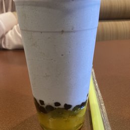 Taro coconut bubble tea with pearls and mango jellies Taro coconut bubble tea with pearls and mango jellies