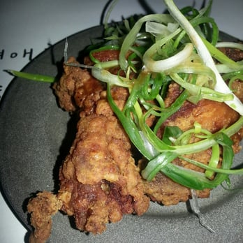 Take31 - Delish fried chicken wings topped with scallions. Sauce comes on the side. Also comes with radish and tomato relish on the side. - Korean Near Me - New York, New York Take31 - Delish fried chicken wings topped with scallions. Sauce comes on the side. Also comes with radish and tomato relish on the side. - Korean Near Me - New York, New York