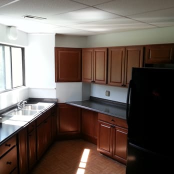 Wolverine Contracting - This project was a Geodesic dome house. Due to severe water damage, we completely gutted the kitchen and renovated on a tight budget. - Painters Near Me - Ann Arbor, Michigan