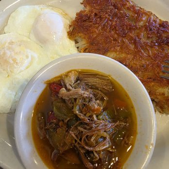 Bisbee Breakfast Club - Over easy eggs, extra crispy hash, pulled pork green chili, side of flour tortilla. This is 1 meal and comes as so. - Breakfast & Brunch Near Me - Chandler, Arizona Bisbee Breakfast Club - Over easy eggs, extra crispy hash, pulled pork green chili, side of flour tortilla. This is 1 meal and comes as so. - Breakfast & Brunch Near Me - Chandler, Arizona