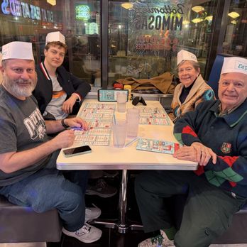 Ed Debevic's - I was relaxing at the restaurant waiting for our food with our funny Ed hats on - Breakfast & Brunch Near Me - Chicago, Illinois
