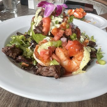 Bistro Cafe - Huge half stuffed Avocado with churrasco and huge shrimp very shareable! - Breakfast & Brunch Near Me - Miami, Florida Bistro Cafe - Huge half stuffed Avocado with churrasco and huge shrimp very shareable! - Breakfast & Brunch Near Me - Miami, Florida