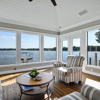 Copper Creek Distributors - a living room overlooking the water - Windows Installation Near Me - Garland, Texas