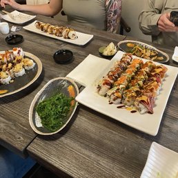 Seaweed salad, rolls, and octopus salad Seaweed salad, rolls, and octopus salad