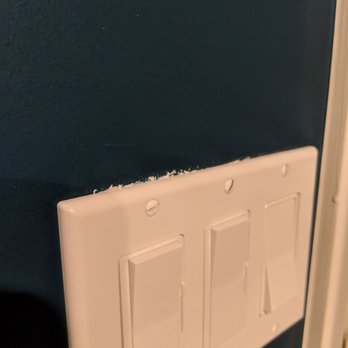 Precision Painting - Plain bad paint job around a couple of the light switches - Painters Near Me - Omaha, Nebraska Precision Painting - Plain bad paint job around a couple of the light switches - Painters Near Me - Omaha, Nebraska