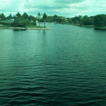 Tri-Rail - Palm Beach County: way up north, this may be your west of I-95 view into neighborhoods surrounded by water. Don't be swimming there. - Trains Near Me - Pompano Beach, Florida Tri-Rail - Palm Beach County: way up north, this may be your west of I-95 view into neighborhoods surrounded by water. Don't be swimming there. - Trains Near Me - Pompano Beach, Florida
