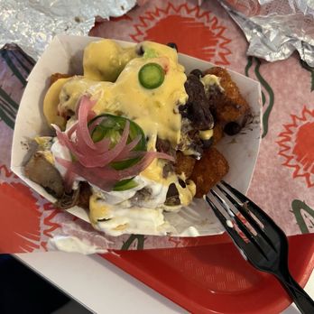 Redheaded Stranger - Totchos - Tacos Near Me - Nashville, Tennessee