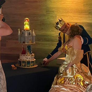 The Cake Boutique - a man and a woman cutting a cake - Custom Cakes Near Me - Albuquerque, New Mexico