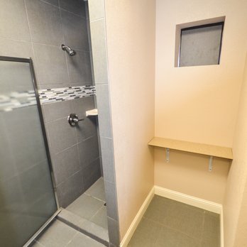 Elite Cabins & RV - Tiled showers in the Clubhouse. - RV Parks Near Me - Big Spring, Texas