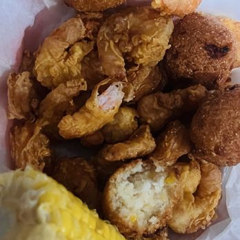 MAD Seafood - Popcorn shrimp (25) meal. My sides Hush Puppies (6) with real corn kernels and Corn on the Cob (1). So good. It may become my go to. - Seafood Near Me - Annandale, Virginia MAD Seafood - Popcorn shrimp (25) meal. My sides Hush Puppies (6) with real corn kernels and Corn on the Cob (1). So good. It may become my go to. - Seafood Near Me - Annandale, Virginia