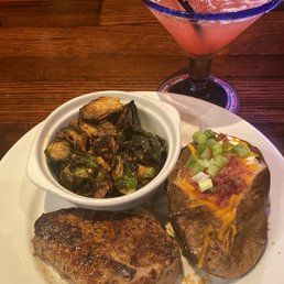 Filet with Brussel Sprouts and loaded baked potato Filet with Brussel Sprouts and loaded baked potato