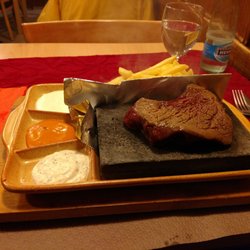 Restaurant Eisenhof - Fresh horse steak cooked on a hot stone.