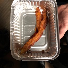 a bacon in a foil container