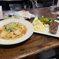 Shannon's Pub & Grille - Shrimp and Scallop Scampi and New York Strip Specials. So frieken good!!!