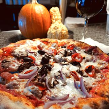 Paesanos - Combo pizza and house red (Josh!) which is $5/glass for Happy Hour. - Italian Near Me - Elk Grove, California