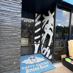 Exterior photo of Happy Clouds Smoke Shop - Austin, Texas Exterior photo of Happy Clouds Smoke Shop - Austin, Texas
