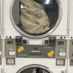 Garden Island Laundry - Big dryers, 25¢ per 5 minutes. I suggest quarters over the card so you can stack the time and leave.