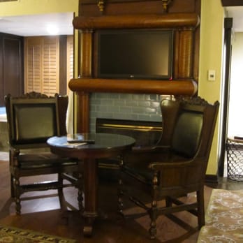The Cheshire - Lovely seating area in the Treasure Island novelty suite. - Hotels Near Me - St. Louis, Missouri
