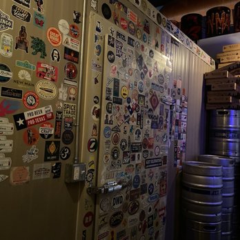 Tin Man - This is my favorite wall! The wall of stickers - Beer Bar Near Me - El Paso, Texas Tin Man - This is my favorite wall! The wall of stickers - Beer Bar Near Me - El Paso, Texas