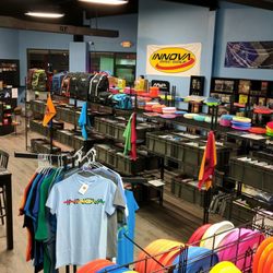 Paper or Plastic Sports and Games - Store Interior. We sell disc, games, and provide a place to play as well!