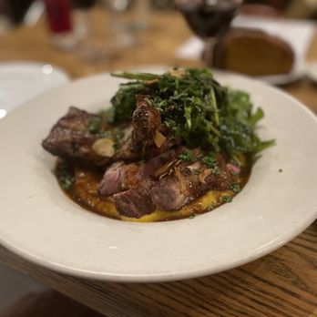 La Cuchara - a plate of food on a table - Basque Near Me - Baltimore, Maryland La Cuchara - a plate of food on a table - Basque Near Me - Baltimore, Maryland