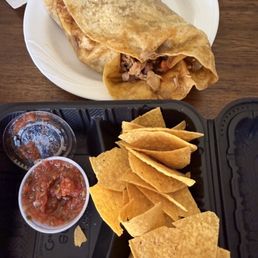 Fajita burrito with a side of chips