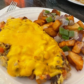 Orange Cafe Bistro - Meat lover scramble... this was SO GOOD! they are not shy on the portions here. All that protein - Breakfast & Brunch Near Me - Orange, California