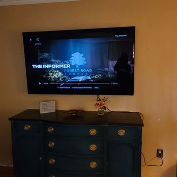 Expert Handyman Services - 65" TV wall mounted - Handyman Near Me
