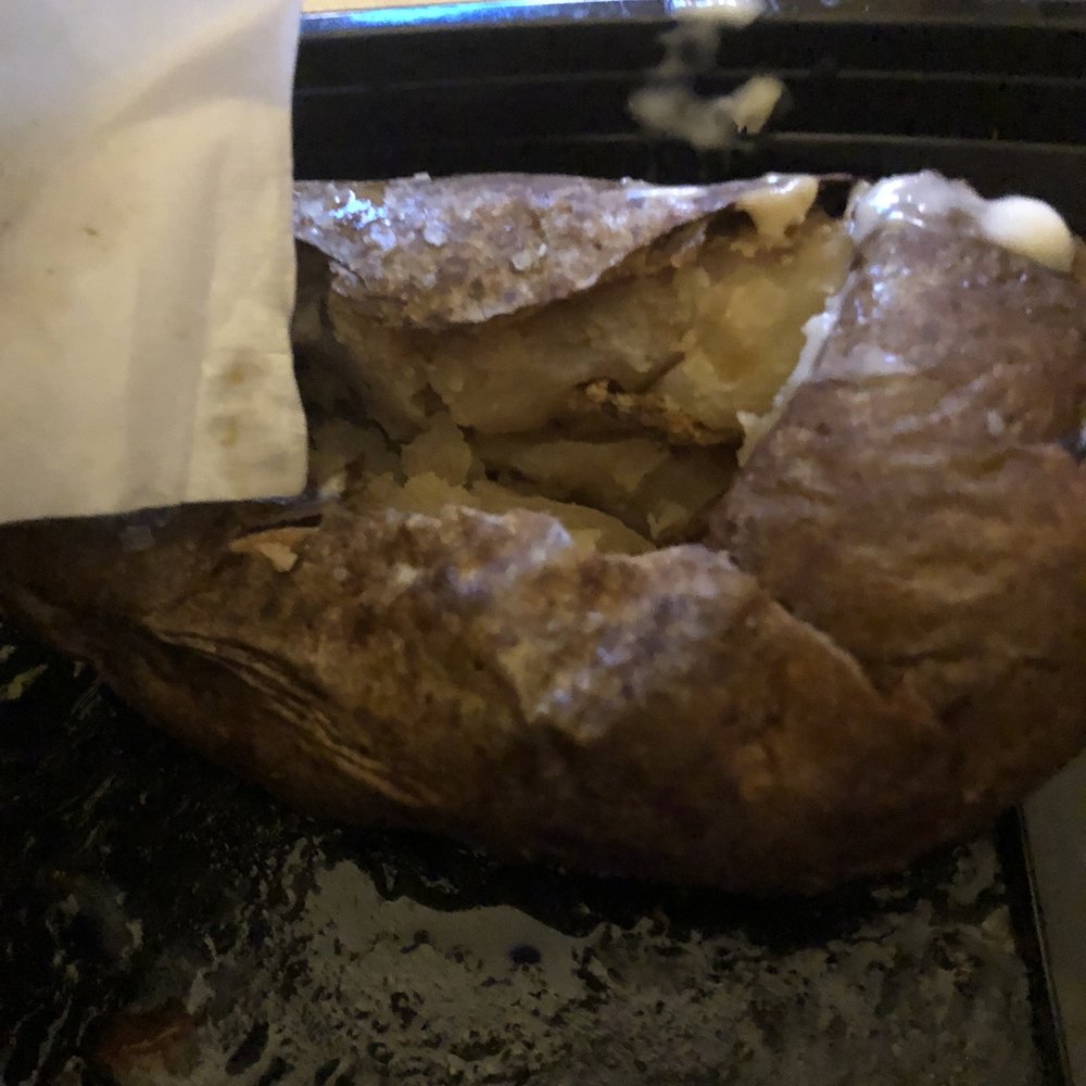 Sizzler - Bad old potato compared to napkin - Seafood Near Me - Pinole, California Sizzler - Bad old potato compared to napkin - Seafood Near Me - Pinole, California
